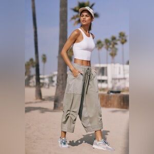 Anthropologie green stripe lined parachute pants